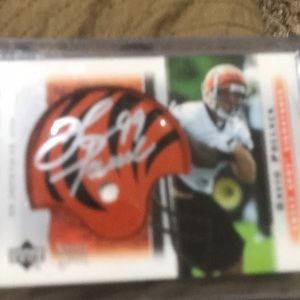 Signed football card with game helmet piece